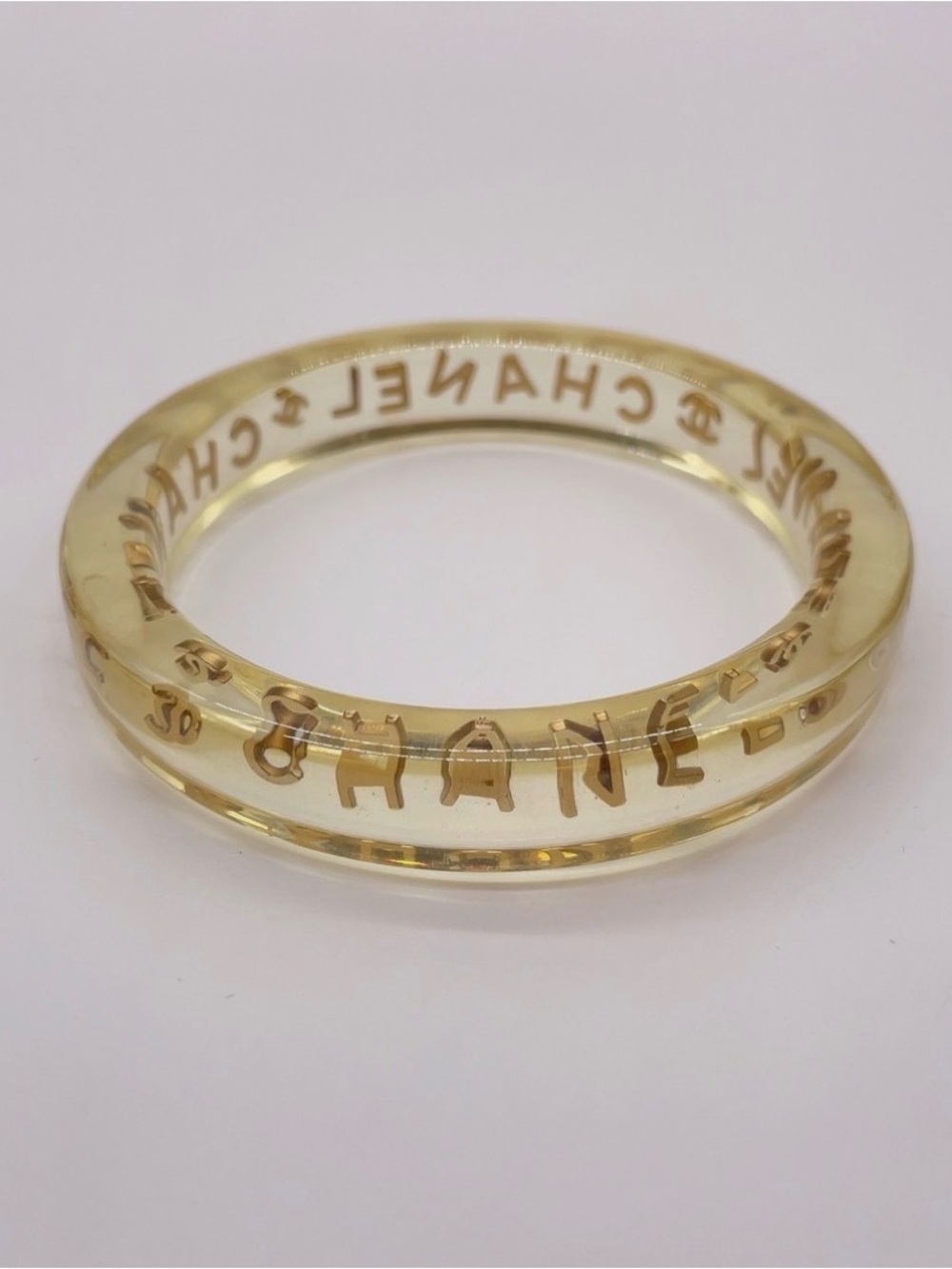 CHANEL LUCITE & Gold Letter Clear Acrylic Bangle - Picture 10 of 12